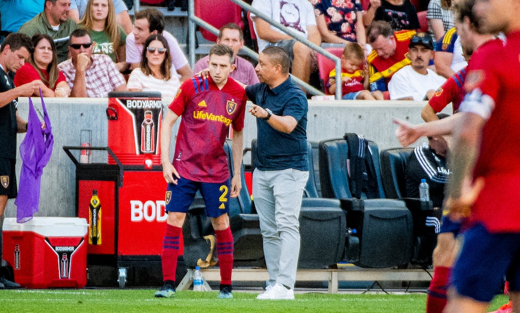 (Isaac Hale | Special to The Tribune) Real Salt Lake head coach Freddy Juarez talks with defender Andrew Brody (2) during a MLS game between Real Salt Lake and Houston Dynamo FC at Rio Tinto Stadium in Sandy on Saturday, June 26, 2021.