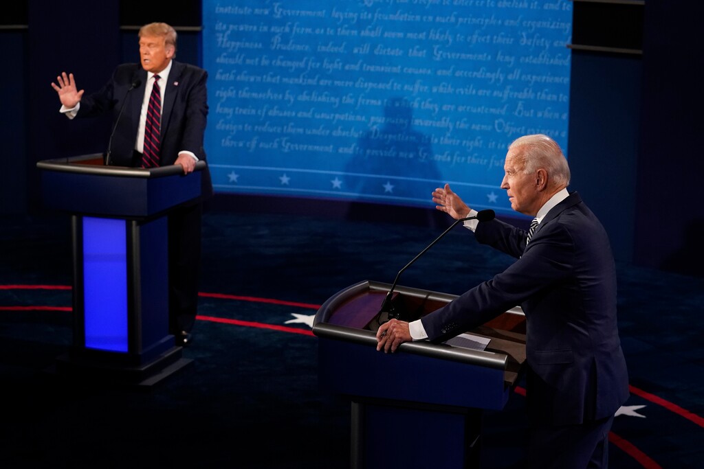 FILE - In this Sept. 29, 2020, file photo President Donald Trump and Democratic presidential candidate former Vice President Joe Biden exchange points during their first presidential debate at Case Western University and Cleveland Clinic, in Cleveland, Ohio. (AP Photo/Morry Gash, Pool, File)