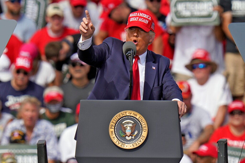 (Chris O'Meara | AP file photo)  President Donald Trump gestures during a campaign rally Thursday, Oct. 29, 2020, in Tampa, Fla.