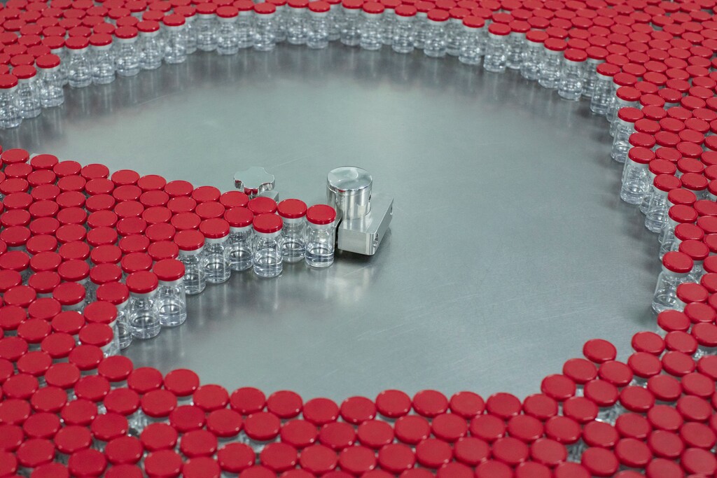 (Emile Ducke | The New York Times)
Vials of the Sputnik V vaccine on a production line in St. Petersburg, Russia, Feb. 17, 2021. "American vaccine nationalism means that we are hoarding both vaccines and the raw materials to make them, in ways that lead to unnecessary deaths abroad and also undermine our own recovery," The New York Times columnist Nicholas Kristof writes.