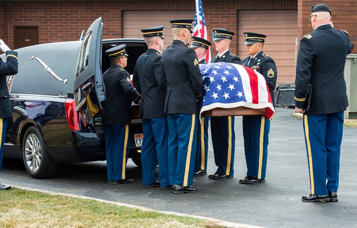 (Rick Egan  |  The Salt Lake Tribune)     The Honor Guard brings the casket out to the hearse, at the gravesite of 2nd Lt. Lynn W. Hadfield, who was killed during the Second World War, at Veterans Memorial Park, in Bluffdale. Thursday, March 21, 2019.


