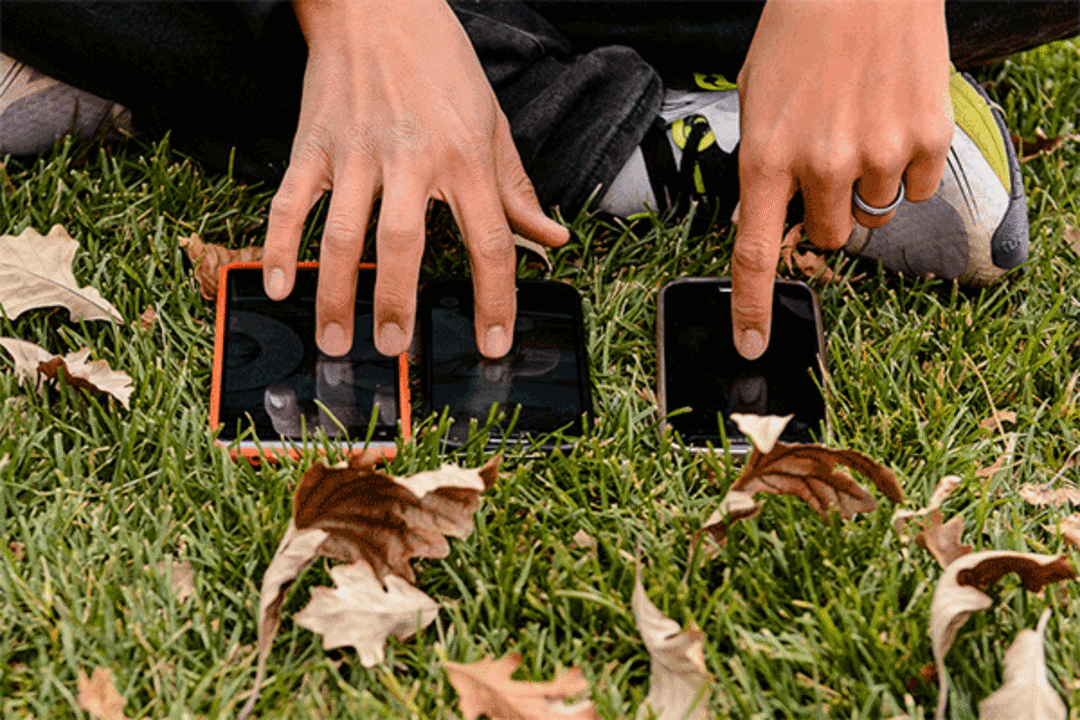 (Trent Nelson | The Salt Lake Tribune)  A Pokemon Go player uses three devices simultaneously while participating in a raid at the University of Utah in Salt Lake City on Thursday, Oct. 19, 2017.