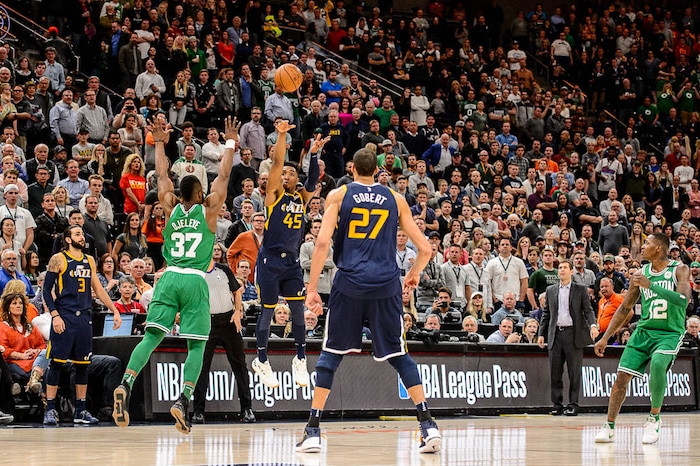 (Trent Nelson | The Salt Lake Tribune)  
Utah Jazz vs. Boston Celtics, NBA basketball in Salt Lake City, Wednesday March 28, 2018. Utah Jazz guard Donovan Mitchell (45) throws up a shot as time expires.