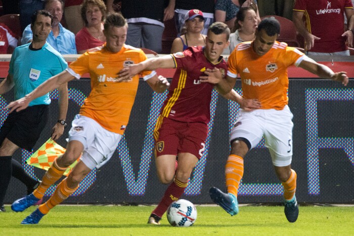 (Rick Egan | The Salt Lake Tribune) Real Salt Lake forward Jefferson Savarino (7) tries to get to the ball, as Houston Dynamo defender Dylan Remick (15) and Houston Dynamo midfielder Juan Cabezas (5) defend, in MLS action, Real Salt Lake vs. Houston Dynamo, in Sandy, Saturday, August 5, 2017.