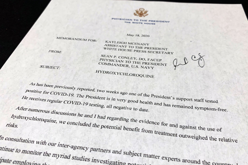 (Jon Elswick | AP) The letter from White House physician Sean Conley to White House press secretary Kayleigh McEnany about President Donald Trump taking Hydroxychloroquine is photographed Monday, May 18, 2020. Trump says he has taken the unproven malaria drug to prevent symptoms should he get coronavirus.