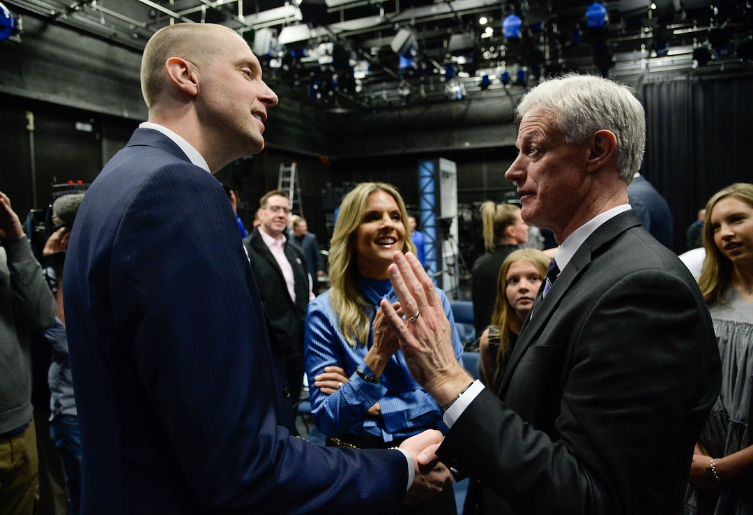 (Francisco Kjolseth  |  The Salt Lake Tribune)  Mark Pope, alongside his wife Lee Anne speaks with BYU president Kevin Worthen after being introduced as its new head basketball coach during a press event at the BYU broadcasting building on Wed. April 10, 2019.