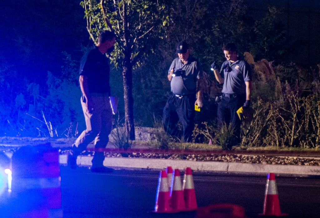 (Rick Egan  |  The Salt Lake Tribune)     Police investigate the site where Unified police reported officers shot and killed a 22-year-old man Friday evening in Midvale on Friday, Sept. 18, 2020.