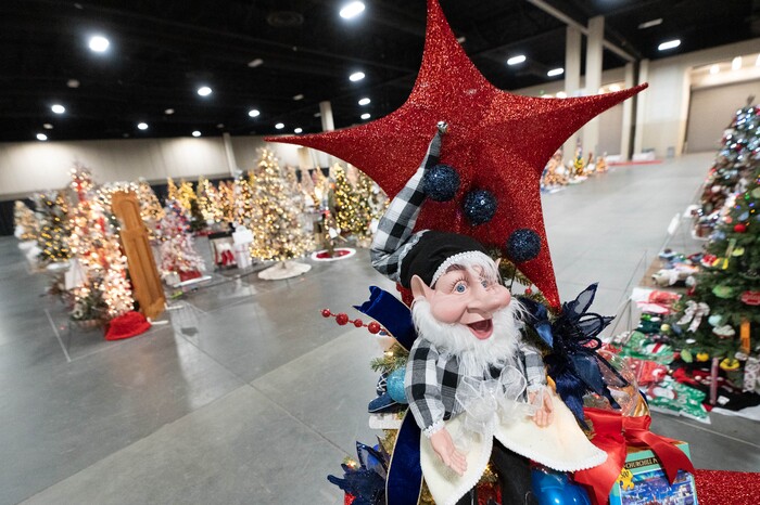 (Francisco Kjolseth | The Salt Lake Tribune) A tree honoring high school art teacher Rudolph “Rudy” James Gunter is displayed during the 51st annual Festival of Trees at the Mountain America Expo Center in Sandy on Tuesday, Nov. 30, 2021.