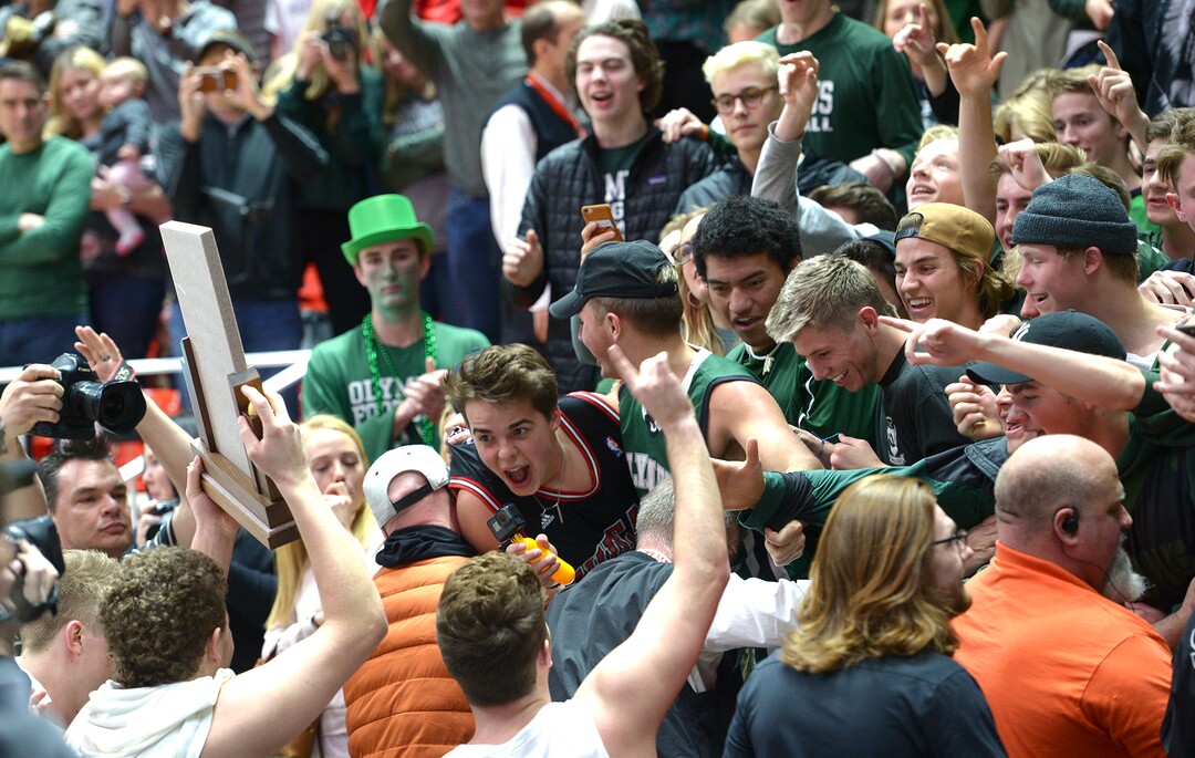 (Leah Hogsten  |  The Salt Lake Tribune) Olympus celebrates the win. Olympus defeated Corner Canyon 76-49 to win the 5A High School Boys’ Basketball Tournament Championship at the Jon M. Huntsman Center in Salt Lake City,  Saturday, March 3, 2018. 