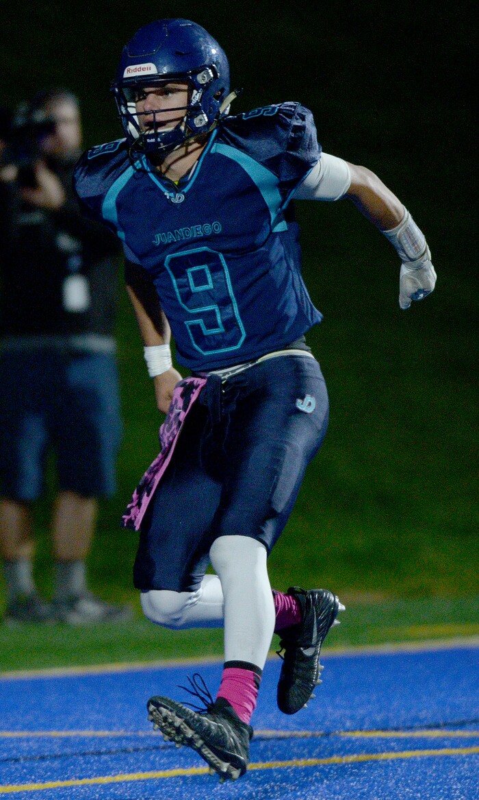 (Leah Hogsten | The Salt Lake Tribune) Juan Diego quarterback Zach Hoffman celebrates his touchdown. Summit Academy boys' football team leads Juan Diego High School 51-43 during their game, October 13, 2017 in Draper.