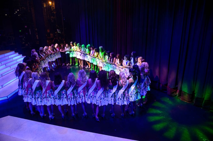 (Trent Nelson | The Salt Lake Tribune)
Contestants gather for a prayer before the curtain goes up at the Miss Utah pageant in Salt Lake City, Wednesday June 13, 2018.