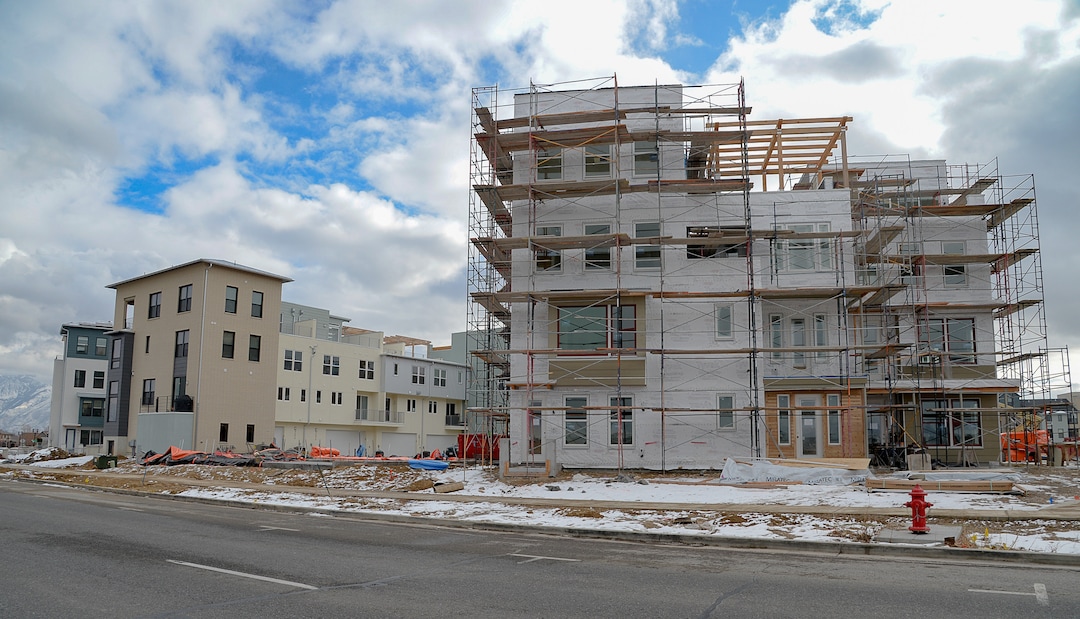 (Francisco Kjolseth  |  The Salt Lake Tribune) Ongoing development takes shape around Oquirrh Lake at Daybreak on Thursday, Jan. 9, 2020. Daybreak, the 4,100-acre master planned community in South Jordan, illustrates the idea of blending higher density housing and walkable community design with ample amounts of open space. That "smart growth" land use approach is being required by Salt Lake County for a proposed development called Olympia Hills, a 933-acre residential and commercial project proposed west of Herriman.