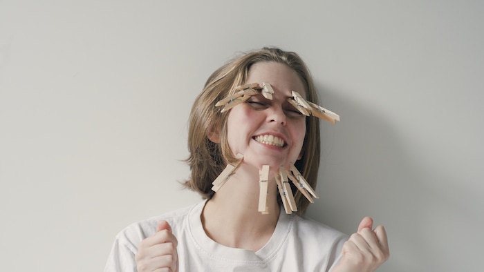 (Oscar Axel Thorborg | Guerilla Creative) A young Australian woman (Grace Davison) tries to entertain herself in "Self Isolation: A COVID 19 Story," directed by Oscar Axel Thorborg, one of the short films in The Salt Lake Tribune's Quarantine Film Festival.