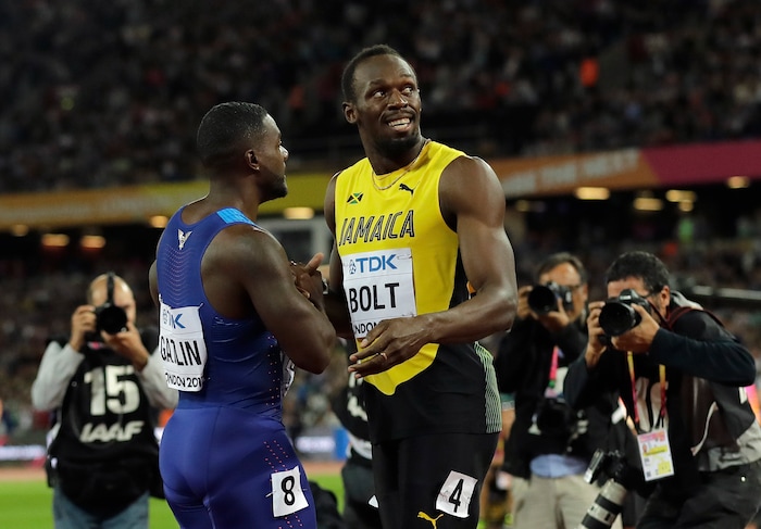 United States' Justin Gatlin, left, shakes hands with Jamaica's Usain Bolt after winning the Men's 100 meters final during the World Athletics Championships in London Saturday, Aug. 5, 2017. (AP Photo/Tim Ireland)