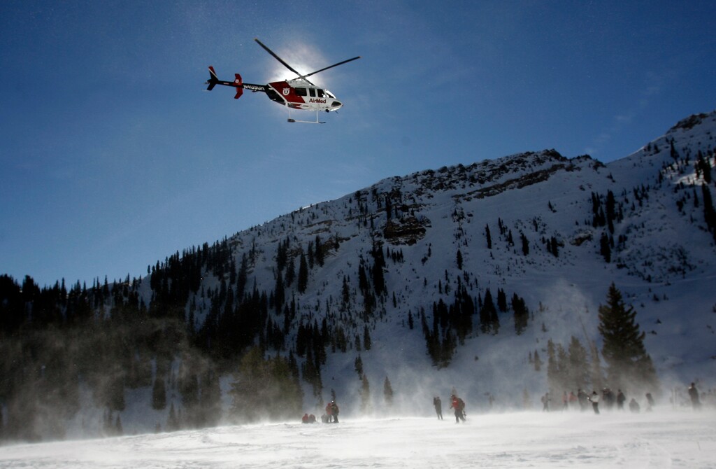  Rick Egan   |  The Salt Lake TribuneAn AirMed helicopter stirs up the snow as it searches for a signal from a beacon, in Mineral Basin at Snowbird Ski Resort.  Wasatch Backcountry Rescue (WBR), University of Utah Health Care's AirMed and the Salt Lake County Sheriff's conducted a backcountry rescue training at Snowbird,Friday, January 8, 2010 Members of the Snowbird Ski Patrol, WBR and AirMed used long-range receivers (beacon locator equipment) in a simulated avalanche rescue, with the assistance of Snowbird avalanche rescue dogs.   