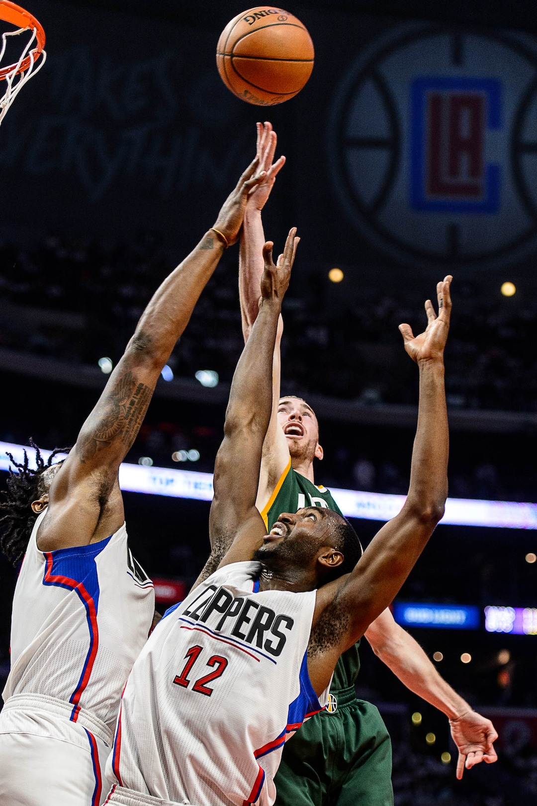 (Trent Nelson | Tribune file photo) Utah Jazz forward Gordon Hayward (20) reaches for the rebound, with LA Clippers center DeAndre Jordan (6) and LA Clippers forward Luc Mbah a Moute (12) in foreground, as the Utah Jazz face the Los Angeles Clippers in Game 7 at STAPLES Center in Los Angeles, California, Sunday April 30, 2017.