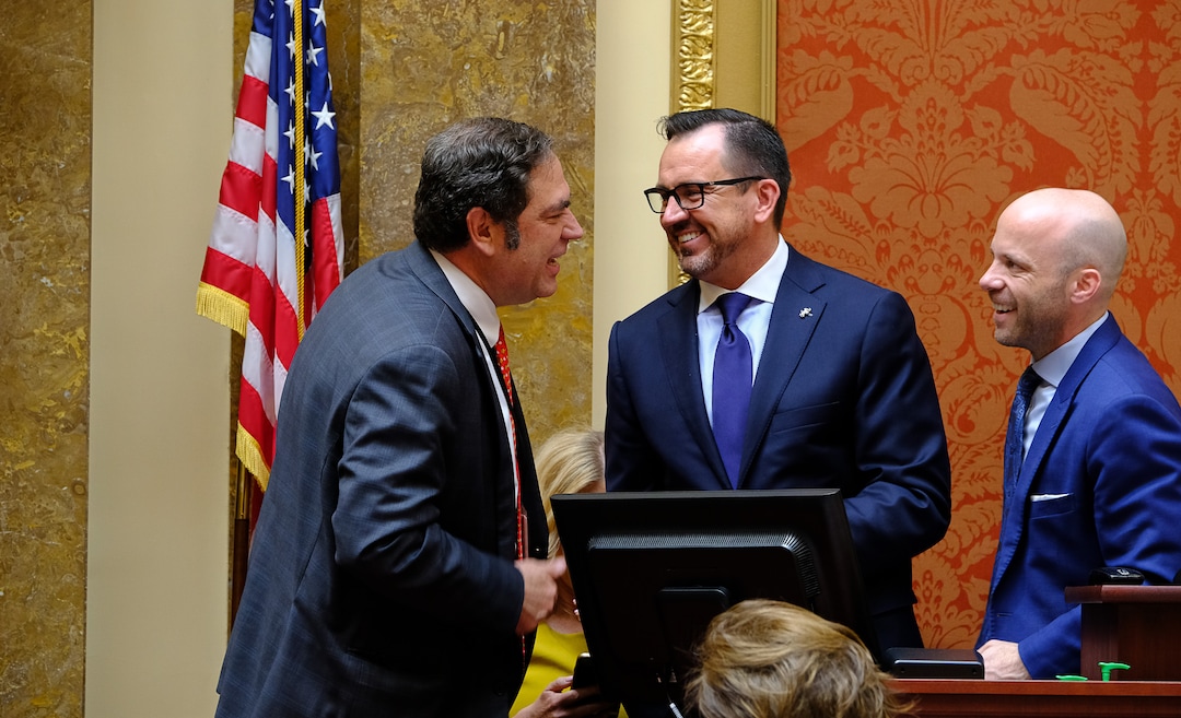 (Francisco Kjolseth  |  The Salt Lake Tribune)  Rep. Brian King, D-Salt Lake, left, speaks with House speaker Greg Hughes, center,  and Chief of Staff Greg Hartley as the Legislature called itself into special session to attempt to override Gov. Gary Herbert's vetoes of two bills on Wed. April 18, 2018.