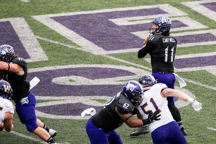 (Chris Detrick  |  The Salt Lake Tribune)  Weber State Wildcats quarterback Stefan Cantwell (11) throws a touchdown pass to Weber State Wildcats wide receiver Drew Batchelor (13) during the game at Stewart Stadium Saturday, November 25, 2017.  