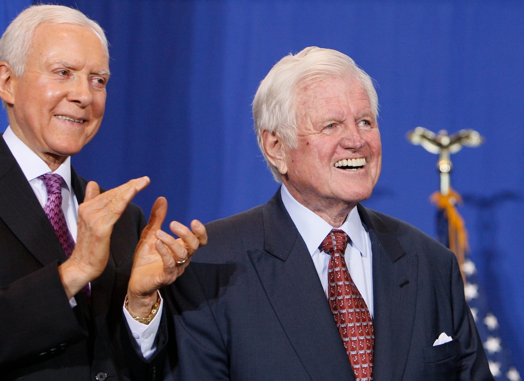 Bill co-sponsors Sen. Orrin Hatch, R-Utah, and Sen. Edward Kennedy, D-Mass., listen as President Barack Obama speaks before signing the Edward M. Kennedy Serve America Act at the SEED School of Washington, a public boarding school that serves inner-city students facing problems in both the classroom and at home, as Vice President Joe Biden, his wife Jill Biden, Sen. Ted Kennedy, D-Mass., former President Bill Clinton, and Rosalyn Carter look on in Washington, Tuesday, April 21, 2009. (AP Photo/Charles Dharapak)