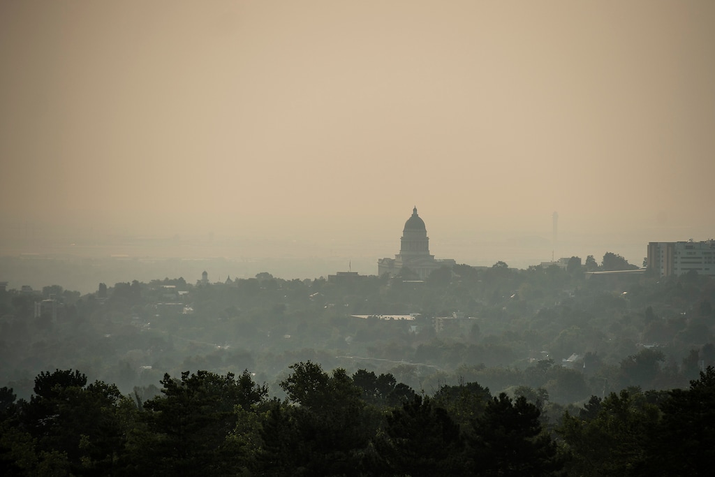 (Chris Detrick  |  The Salt Lake Tribune)  Smoke from wildfires burning across the western U.S. is worsening air conditions on the Wasatch Front, as seen in downtown Salt Lake City Wednesday, September 6, 2017. 