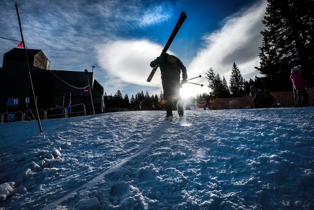 (Steve Griffin  |  The Salt Lake Tribune) A skiers heads up the hill to the lifts at Brighton ski area in Salt Lake City Monday January 1, 2018.