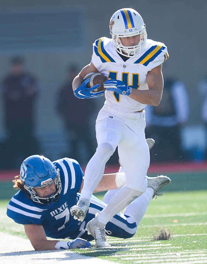 (Francisco Kjolseth  |  The Salt Lake Tribune)  Orem's Trevor Rockey tries to stay in bounds against Dixie in the 4A high school championship game at Rice Eccles Stadium in Salt Lake City, Friday, Nov. 16, 2018.