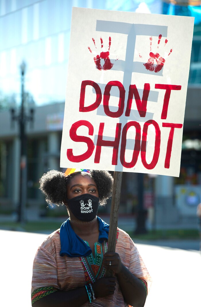 (Rick Egan  |  The Salt Lake Tribune) Taylor Natt marches with protesters on 500 South in Salt Lake City during a demonstration for Bernardo Palacios,--Carbajal on Monday, June 22, 2020.