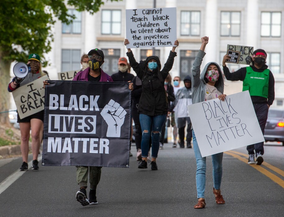(Rick Egan  |  The Salt Lake Tribune)  Protesters march down State Street, during a Black Lives Matter, George Floyd demonstration, Tuesday, June 16, 2020.