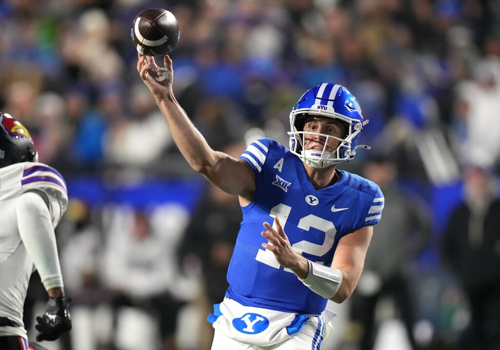 (Bethany Baker | The Salt Lake Tribune) BYU quarterback Jake Retzlaff (12) throws the ball in the game in Provo on Saturday, Nov. 16, 2024.