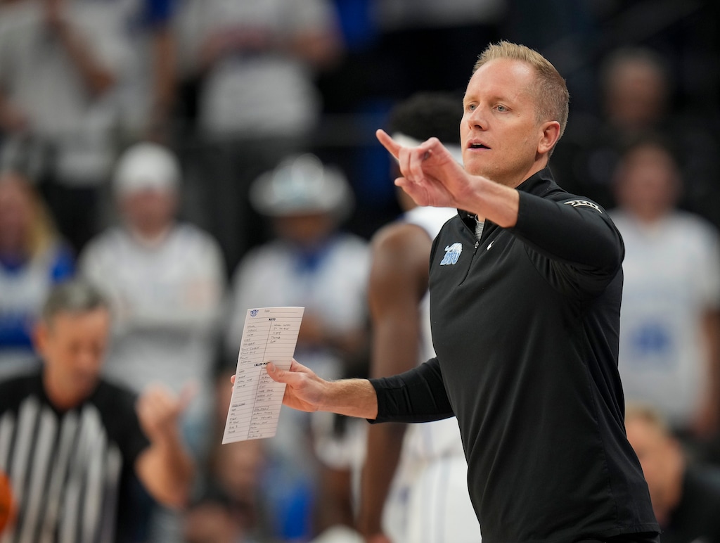 (Bethany Baker  |  The Salt Lake Tribune) BYU Cougars head coach Kevin Young gives direction during the game between the BYU Cougars and the North Carolina Tar Heels at Delta Center on Friday, Oct. 24, 2025.