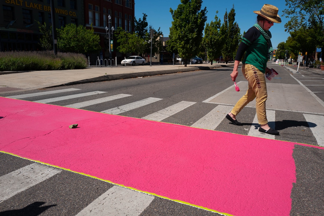 (Trent Nelson  |  The Salt Lake Tribune)  Jann Haworth and the first steps of her Rose art project on Broadway in Salt Lake City on Sunday Aug. 11, 2019.