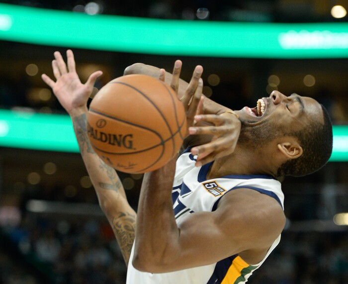 (Francisco Kjolseth  |  The Salt Lake Tribune)  Utah Jazz guard Alec Burks (10) loses control of the ball against the Spurs during the first quarter of an NBA basketball game in Salt Lake City, Thursday, Dec. 21, 2017.