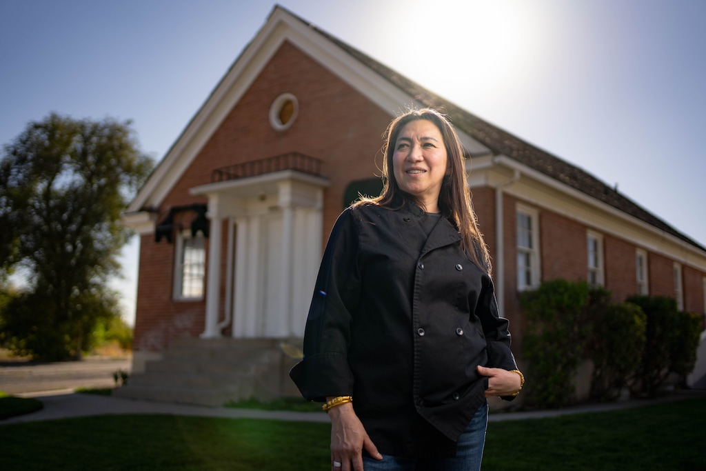 (Francisco Kjolseth | The Salt Lake Tribune) Anny Sooksri, owner of the Tea Rose Diner in Murray for the past 18 years, is pictured on Wednesday, Oct. 2, 2024. Sooksri recently had her offer accepted by the city to buy the historic Murray Baptist Chapel across the street from her restaurant. She plans to remodel the chapel for her restaurant.