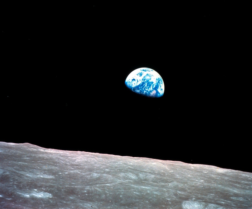 (William Anders/NASA via AP, File) This Dec. 24, 1968, file photo made available by NASA shows the Earth behind the surface of the moon during the Apollo 8 mission.