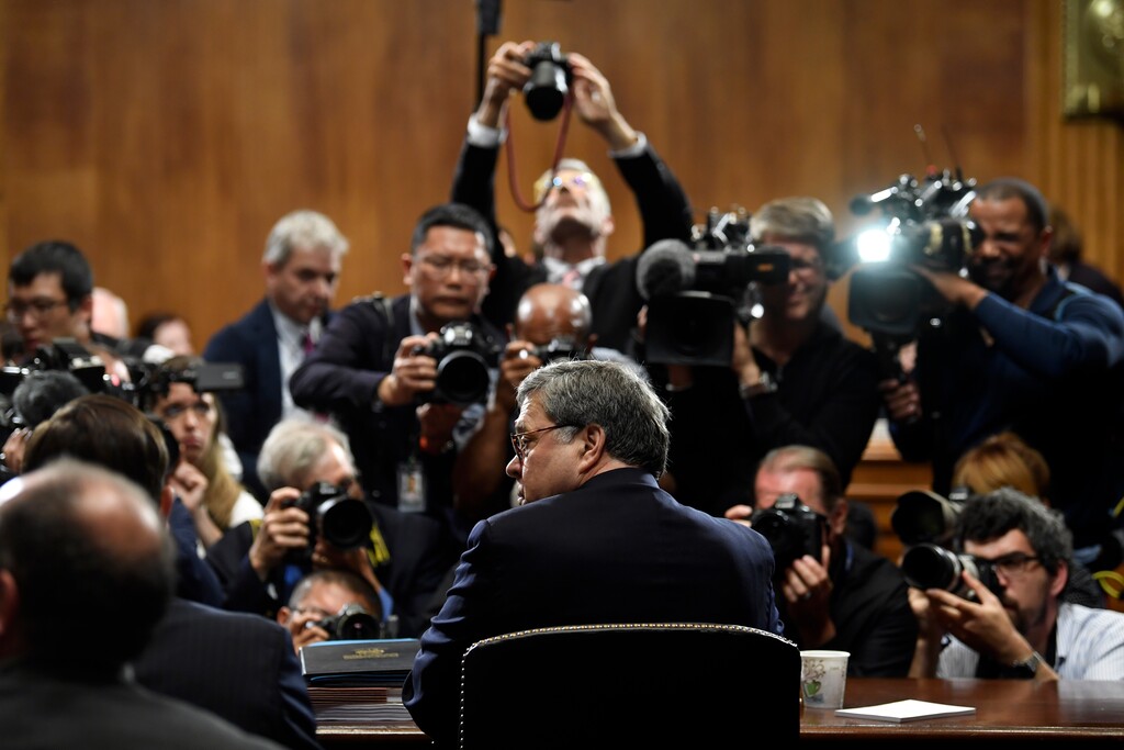 Attorney General William Barr is photographed as he sits down to testify before the Senate Judiciary Committee on Capitol Hill in Washington, Wednesday, May 1, 2019. (AP Photo/Susan Walsh)