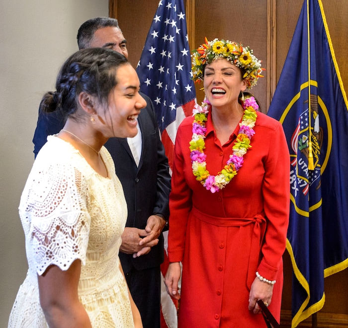 (Steve Griffin | The Salt Lake Tribune) Michelle Kaufusi stands with her husband Steve Kaufusi as she laughs with her niece 'Ainu Kaufusi, after taking the Oath of Office, administered by Judge Vernon Romeny, as she becomes the first female mayor in Provo city's history. The small private ceremony was held in the Mayor's Office in Provo Tuesday January 2, 2018. A public Inauguration Ceremony for Mayor Kaufusi will be held at the Provo Library on January 18, 2018.
