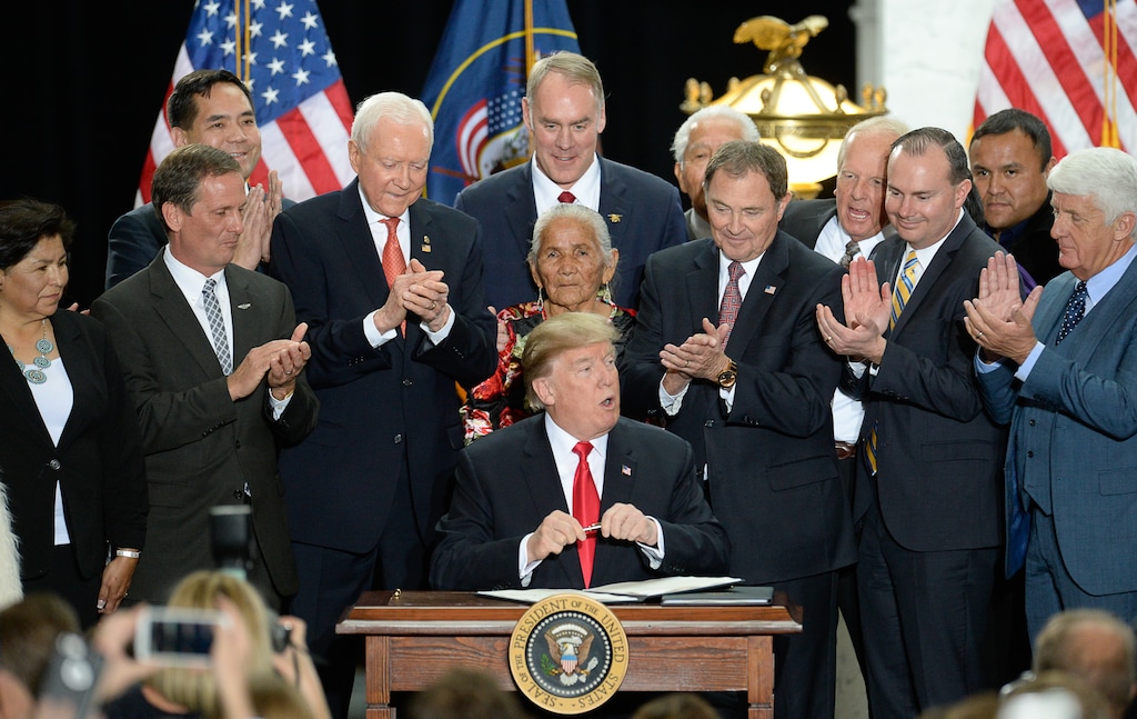 (Francisco Kjolseth | Tribune file photo) In this Dec. 4, 2017, file photo, President Donald Trump is surrounded by Utah leaders at the Utah Capitol, as well as then-San Juan County Commissioner Rebecca Benally (far left), as he signs the presidential proclamation to shrink Bears Ears national monument. San Juan County hired a law firm that paid several lobbyists to pressure then-Interior Secretary Ryan Zinke (center, top) and others in the Trump administration to make the cuts. Newly obtained emails show San Juan County's lobbying effort on Bears Ears.