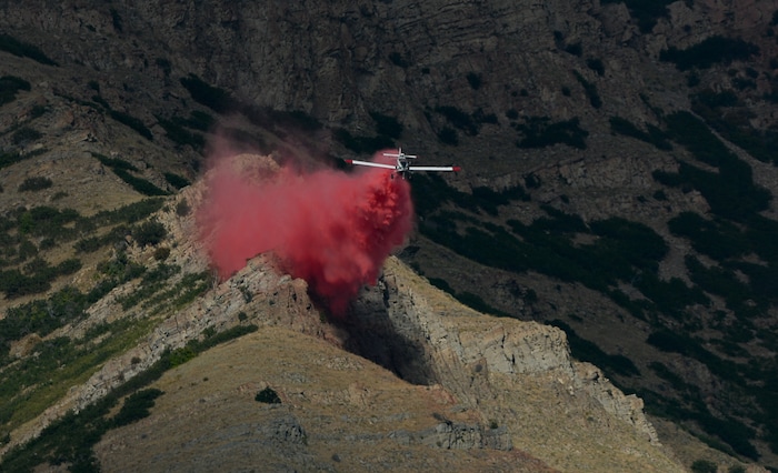 (Francisco Kjolseth  |  The Salt Lake Tribune)  Crews battle a grass fire in Tooele county being dubbed the the Green Ravine fire at it burns on Tuesday, Sept. 3, 2019.