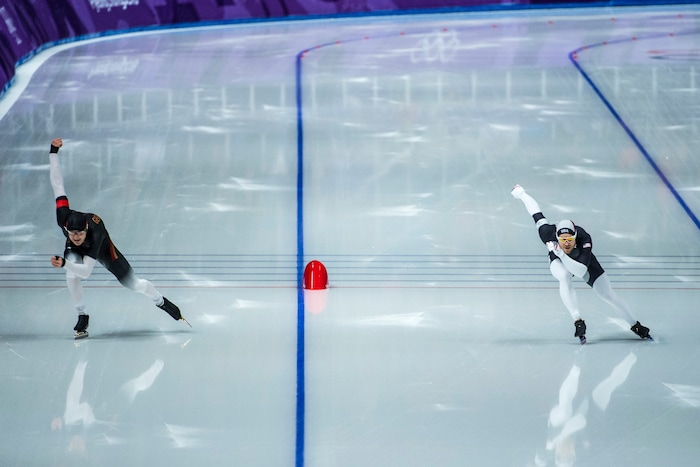 (Chris Detrick  |  The Salt Lake Tribune)  Joey Mantia of the United States races Joel Dufter of Germany in the Men's 1,000m at Gangneung Oval during the Pyeongchang 2018 Winter Olympics Friday, Feb. 23, 2018. Mantia finished in 4th place with a time of 1:08.564. Dufter finished in 14th place with a time of 1:09.46. 