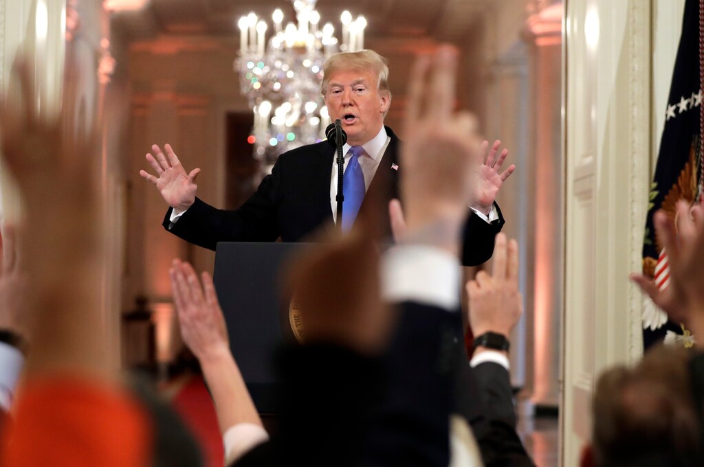 President Donald Trump reacts as reporters raise their hands to ask questions during a news conference in the East Room of the White House, Wednesday, Nov. 7, 2018, in Washington. (AP Photo/Evan Vucci)