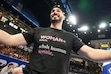 (Nam Y. Huh | AP) Former NBA center Enes Kanter Freedom greets a friend before a WNBA basketball game between the Indiana Fever and the Chicago Sky, Sunday, Aug. 23, 2026, in Chicago.