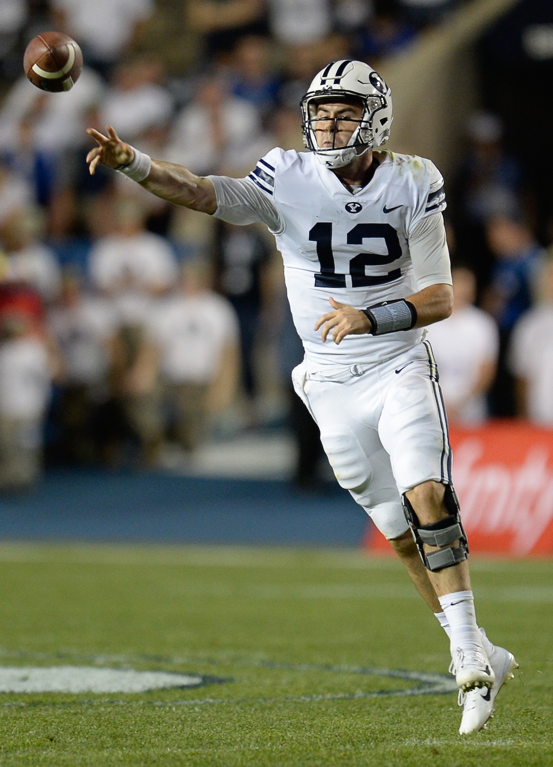 (Francisco Kjolseth  |  The Salt Lake Tribune)  Brigham Young Cougars quarterback Tanner Mangum (12) finds his man while battling California during the second half of the NCAA college football game, Saturday, Sept. 8, 2018, at LaVell Edwards stadium in Provo, Utah.