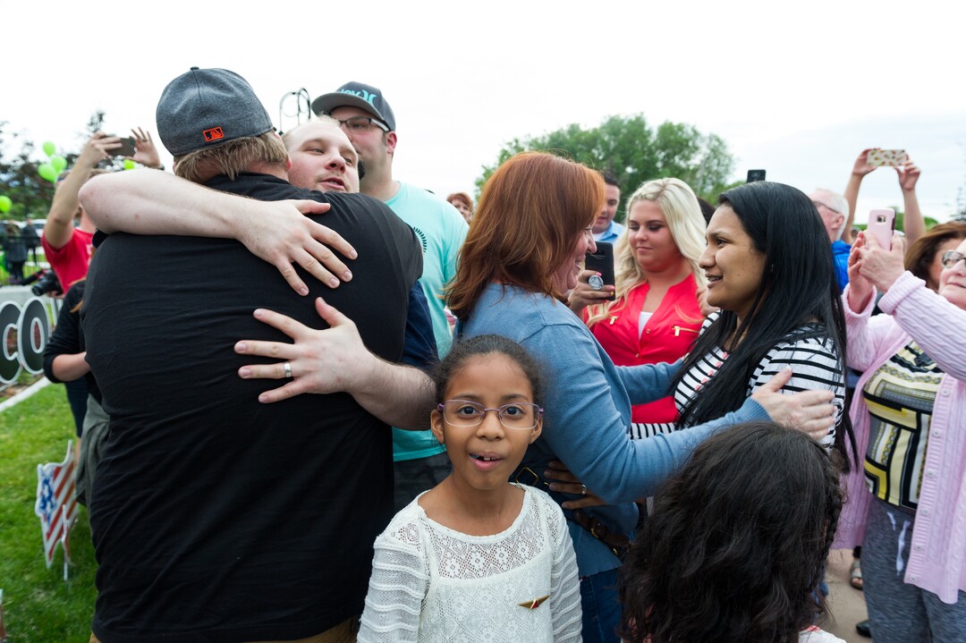 Alex Gallivan  |  Special to the Tribune Hundreds of people tuned out in Riverton to celebrate the arrival of Josh Holt, his wife, Thamy, and their daughter, Marian, Monday, May 28,2018