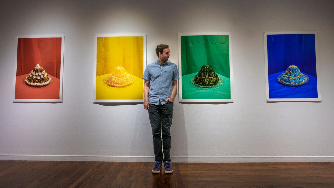 (Leah Hogsten | The Salt Lake Tribune) l-r Primary #2, (Salad), Primary #1 (Cinnamon Jello Salad), Primary #3 (Green Jello with Carrots) and Primary #4 (Jello Delight), Archival Pigment Prints, 2020, from "Marrow" a photo exhibit by Daniel George, center, at The Utah Museum of Contemporary Art, Sept. 3 2021. George examines the culinary and cultural heritage of members of The Church of Jesus Christ of Latter-day Saints. George recreated and photographed dishes from Ward Cookbooks, including Funeral Potatoes, Casseroles, Jello creations, turning food into folk art.