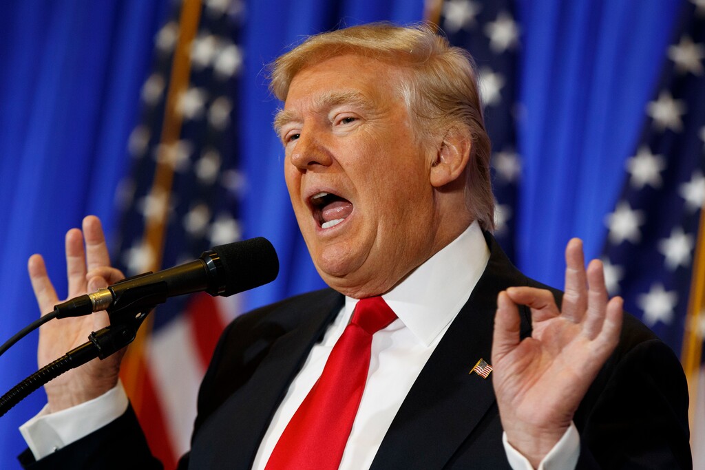 (Evan Vucci | The Associated Press) In this Jan. 11, 2017 file photo, President-elect Donald Trump speaks during a news conference in the lobby of Trump Tower in New York. Trump says his team will have a “full report on hacking within 90 days,” and is again dismissing as fake a document alleging Russia has damaging information about him.