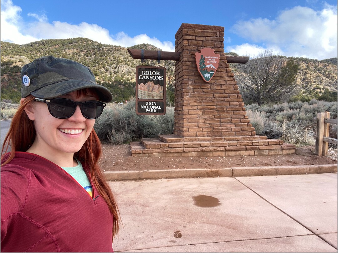 (Emily Pennington  |  Little A) Emily Pennington at the entrance to the Kolob Canyons area of Zion National Park. Pennington has written a memoir, "Feral," about her experience visiting all the national parks in the United States.