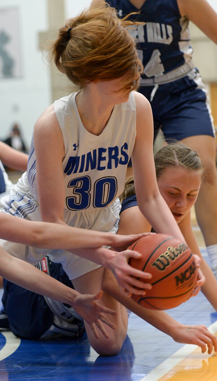 (Leah Hogsten  |  The Salt Lake Tribune) Bingham's Samantha Holman (30) scrambles for a loose ball.  Bingham defeated Copper Hills 48-40 in their semifinal game of the 6A High School Girls' Basketball Tournament at SLCC in Taylorsville, Friday, Feb. 23, 2018. 