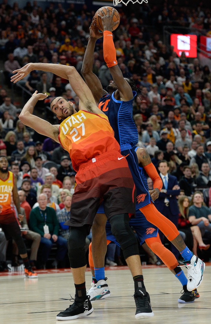 (Francisco Kjolseth  |  The Salt Lake Tribune)   \Utah Jazz center Rudy Gobert (27) loses control of the ball as he's pressured by the Thunder in the NBA game at Vivint Smart Home Arena Sat., Dec. 22, 2018, in Salt Lake City.