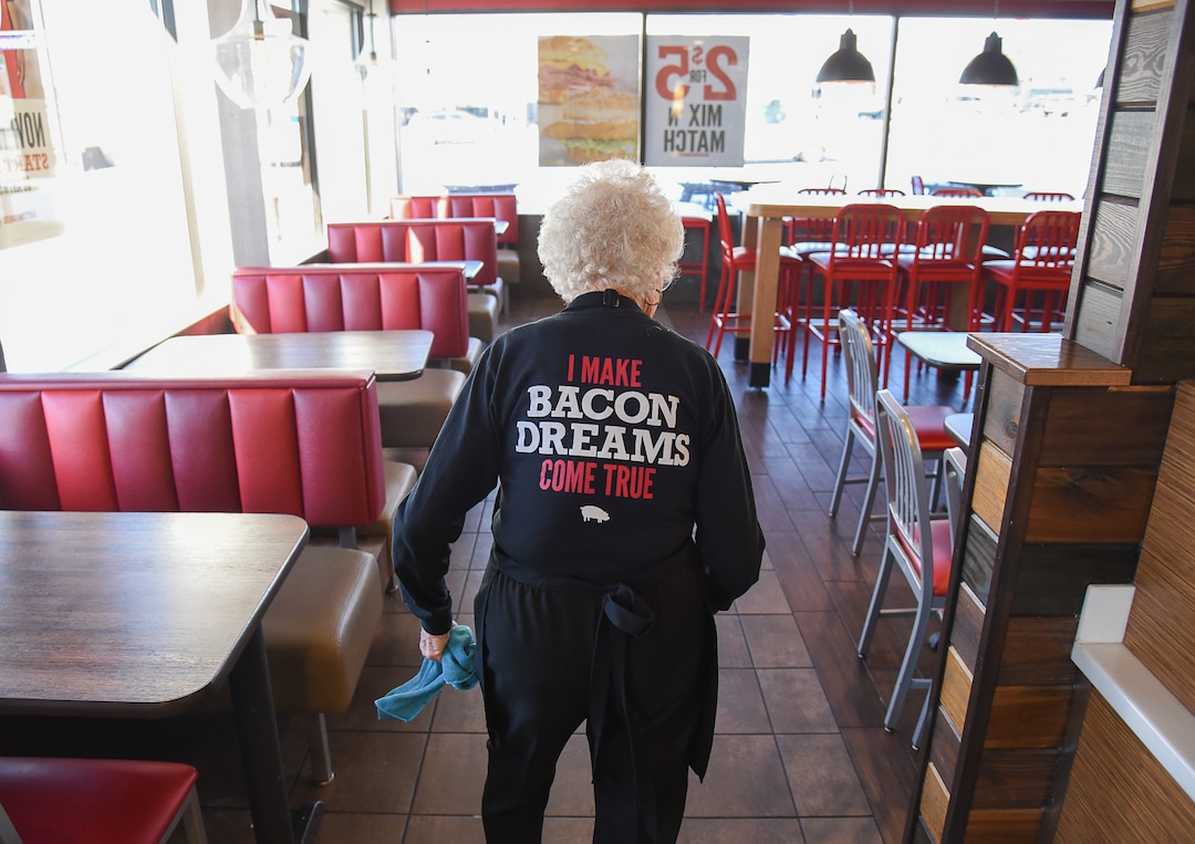 (Francisco Kjolseth  |  The Salt Lake Tribune)  Making the rounds to clean up table tops, after 25 years at Arby's, 94-year-old Dorothy Bale has no plans to retire from the job she started when she was 69.