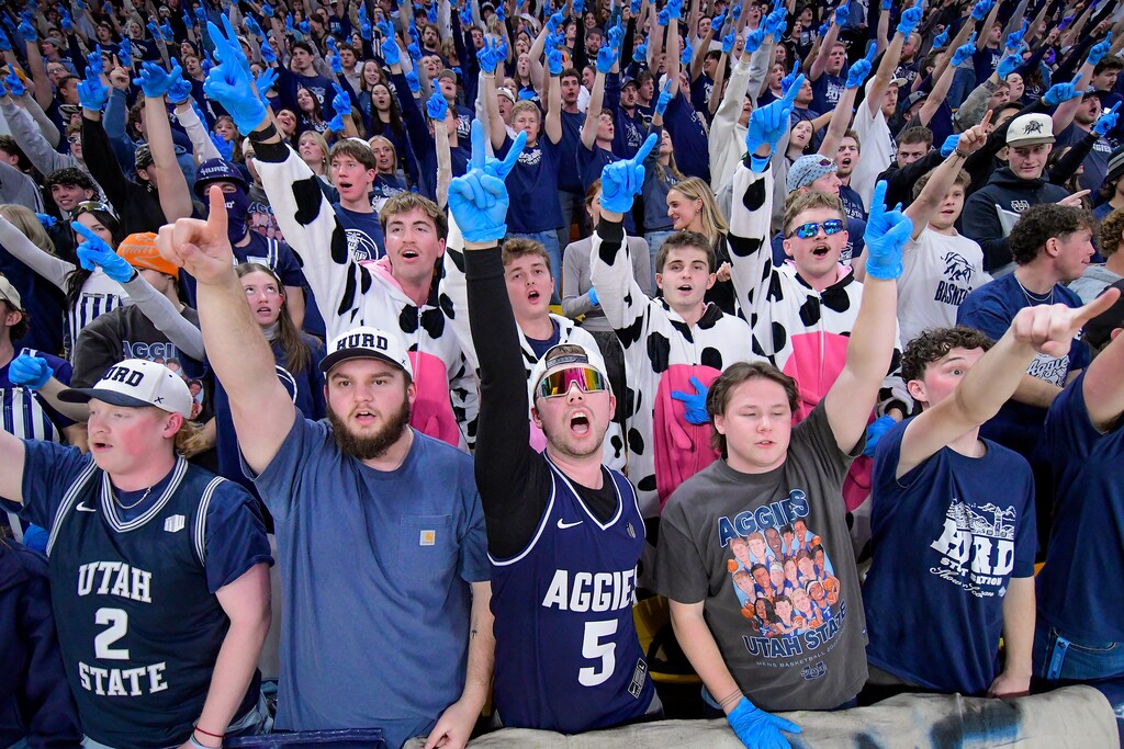 (Eli Lucero | Herald Journal) Utah State fans cheer on the Aggies before the start of a college basketball game against Nevada on Wednesday, Jan. 14, 2026, in Logan.